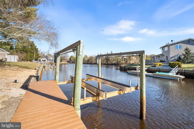a view of swimming pool with seating area
