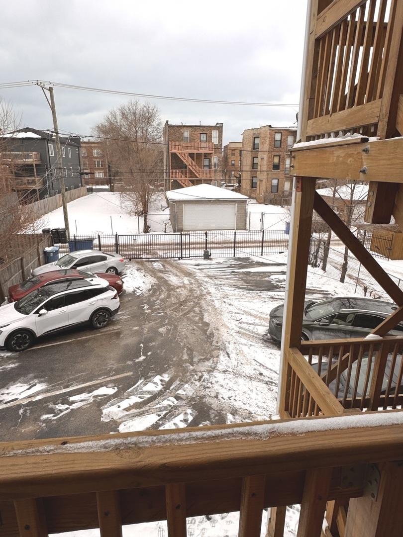 4615 South Michigan Avenue, Unit 2S Chicago, IL 60653 - Photo 26 of 26 a view of balcony with two chairs and a table