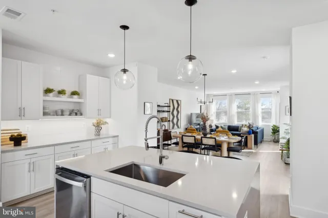 a view of balcony with wooden floor and seating space