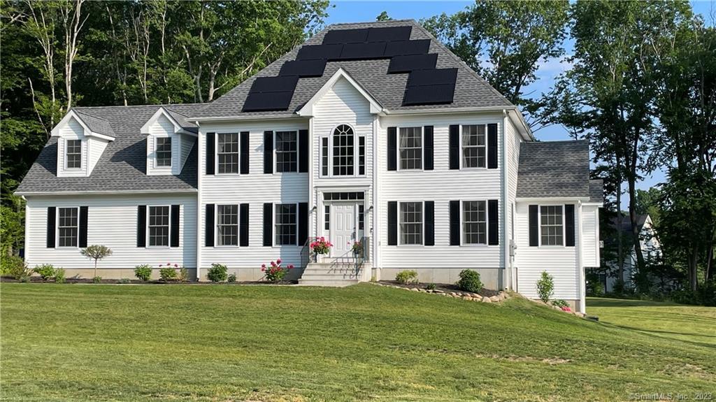 39 Carnic Alps Road Coventry, CT 06238 - Photo 1 of 1 a front view of a house with a garden