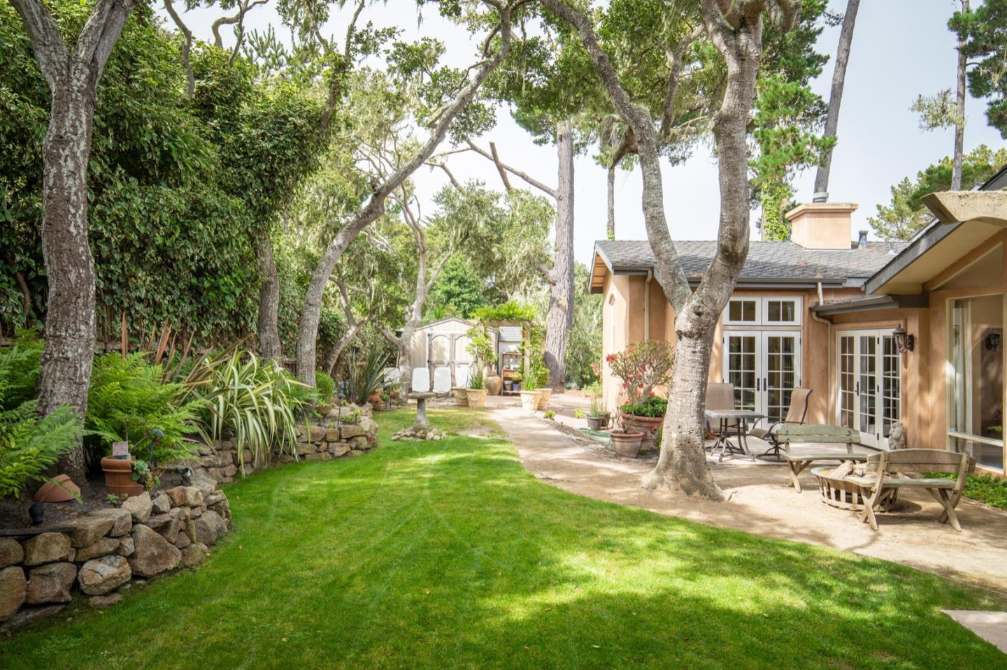 2869 Coyote Road Pebble Beach, CA 93953 - Photo 13 of 35 a view of a house with backyard porch and sitting area