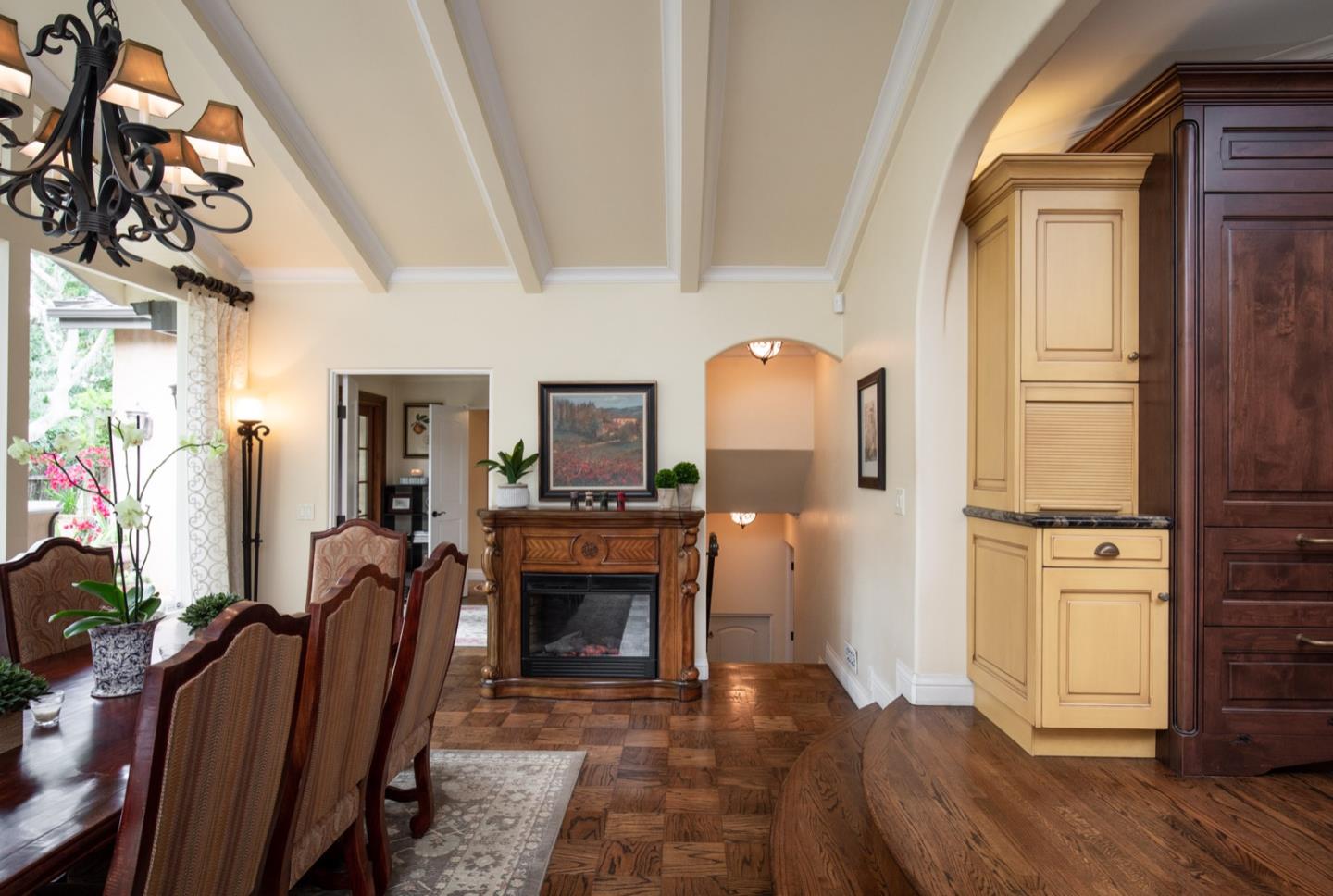 2869 Coyote Road Pebble Beach, CA 93953 - Photo 22 of 35 a living room with furniture a fireplace and a flat screen tv