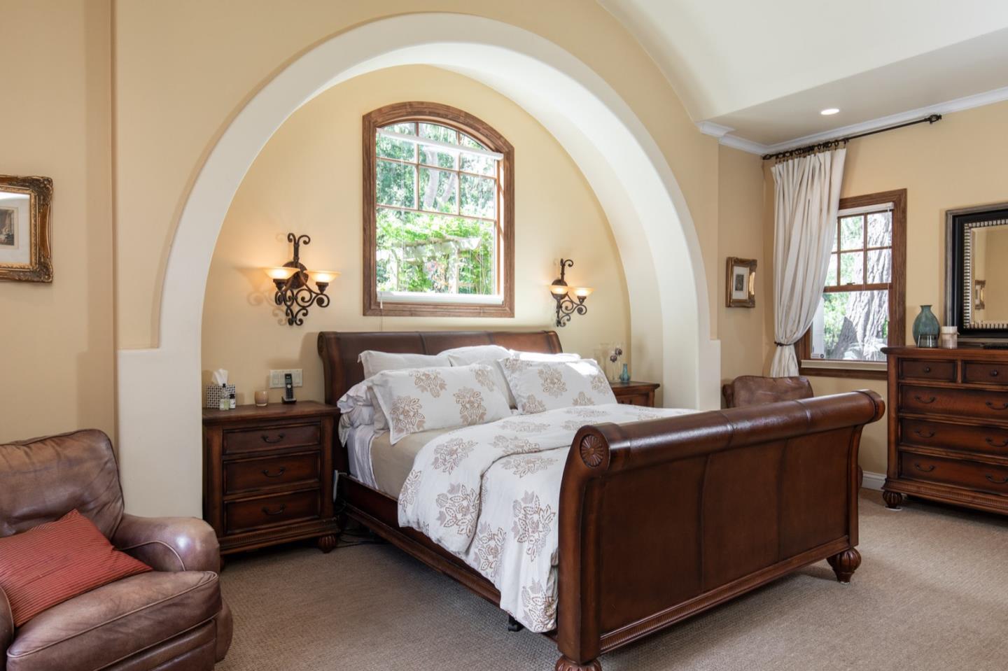 2869 Coyote Road Pebble Beach, CA 93953 - Photo 24 of 35 a bedroom with a bed and a couch