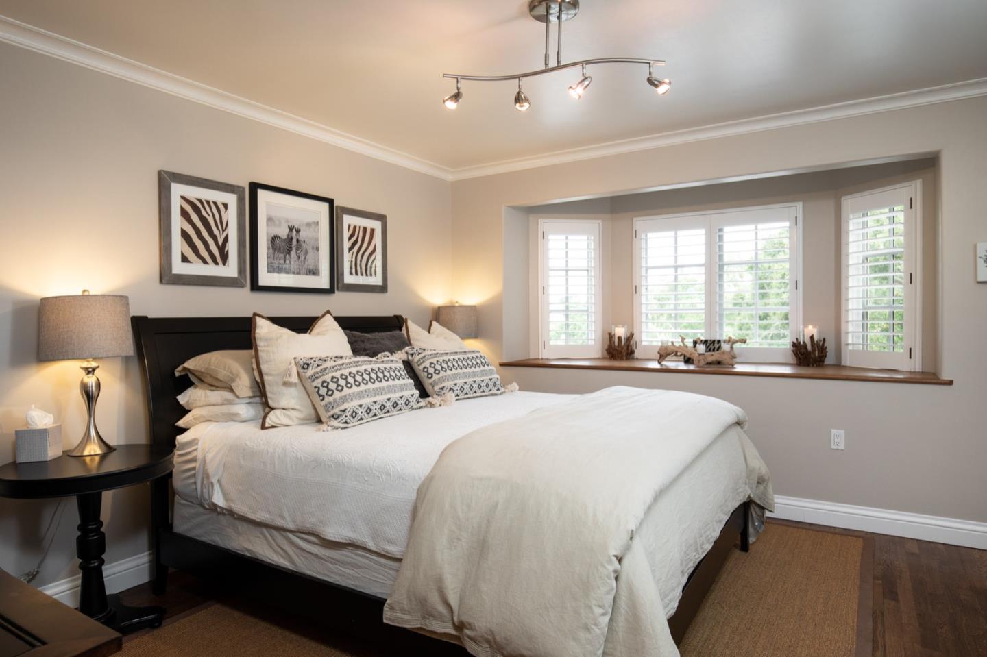 2869 Coyote Road Pebble Beach, CA 93953 - Photo 27 of 35 a spacious bedroom with a bed and window