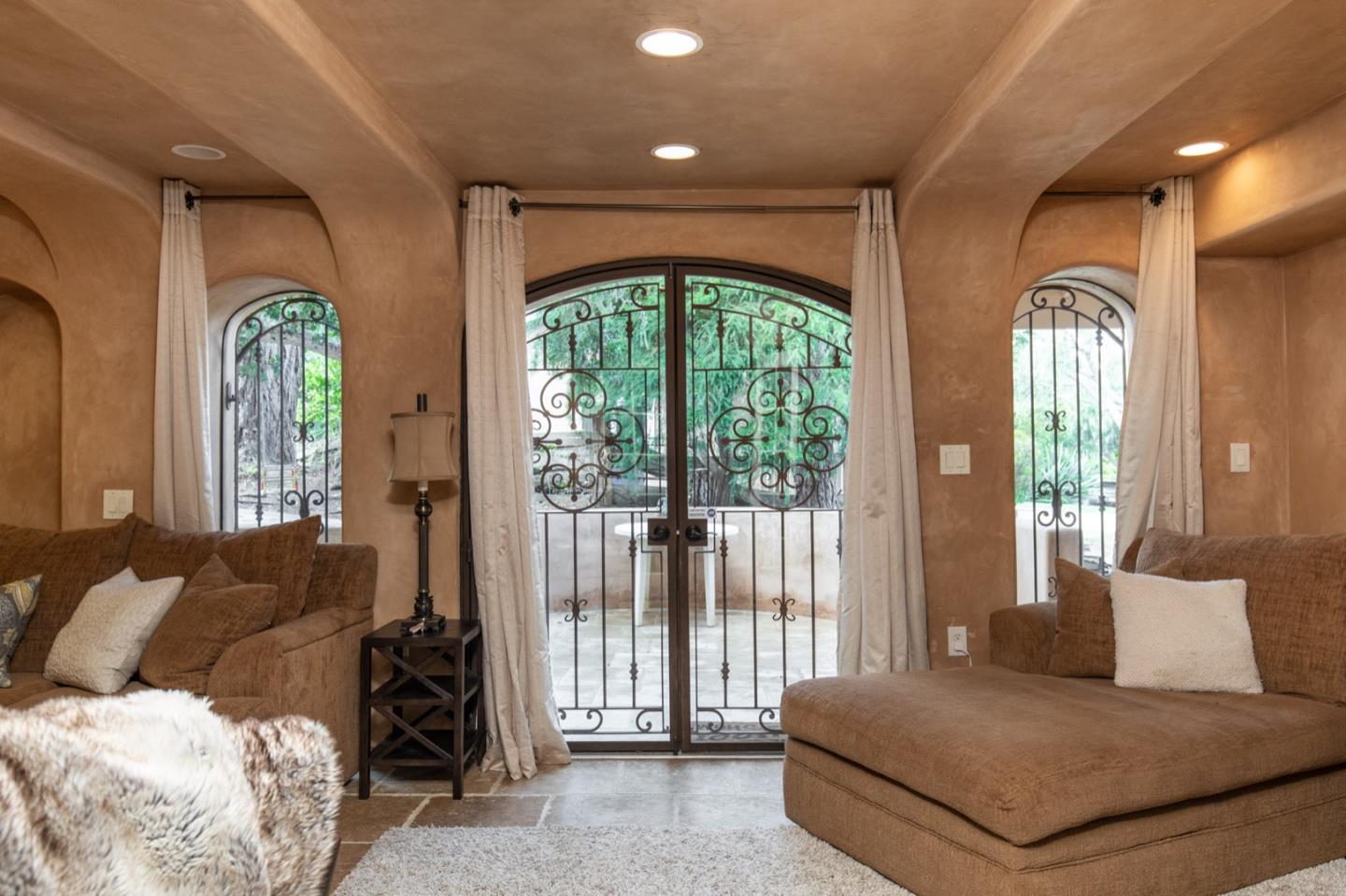 2869 Coyote Road Pebble Beach, CA 93953 - Photo 34 of 35 a living room with furniture and a large window