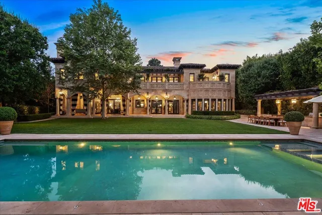 a view of a house with a big yard