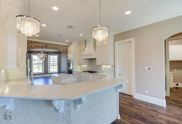 a view of kitchen and sink