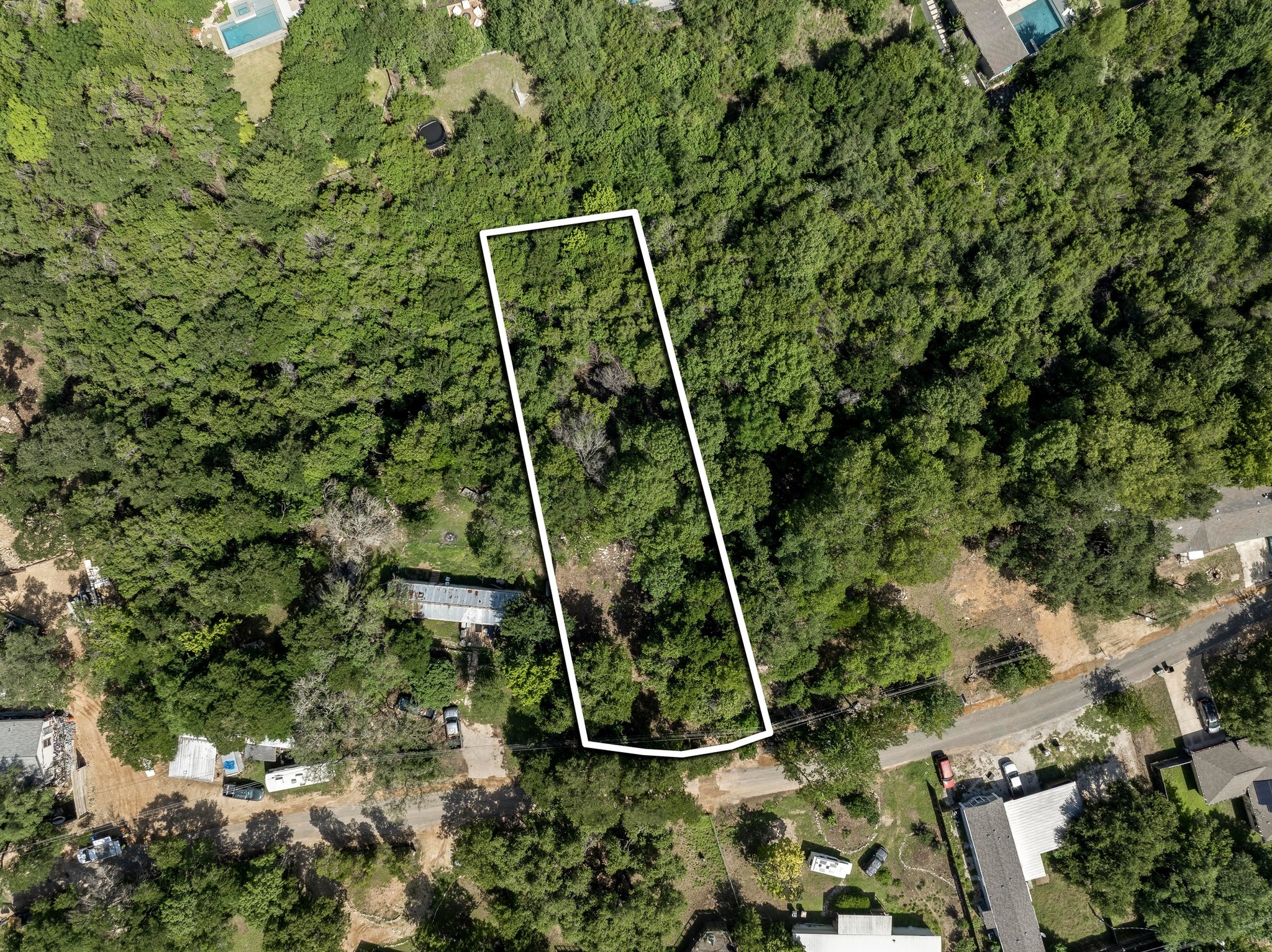 1602 Miami Drive Austin, TX 78733 - Photo 10 of 10 a backyard of a house with lots of green space