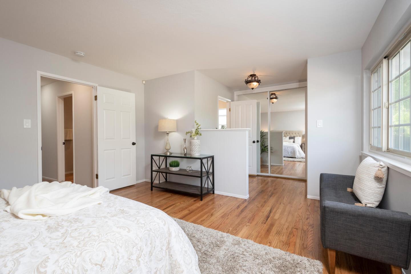 3115 Rivera Drive Burlingame, CA 94010 - Photo 16 of 26 a bedroom with a bed and furniture