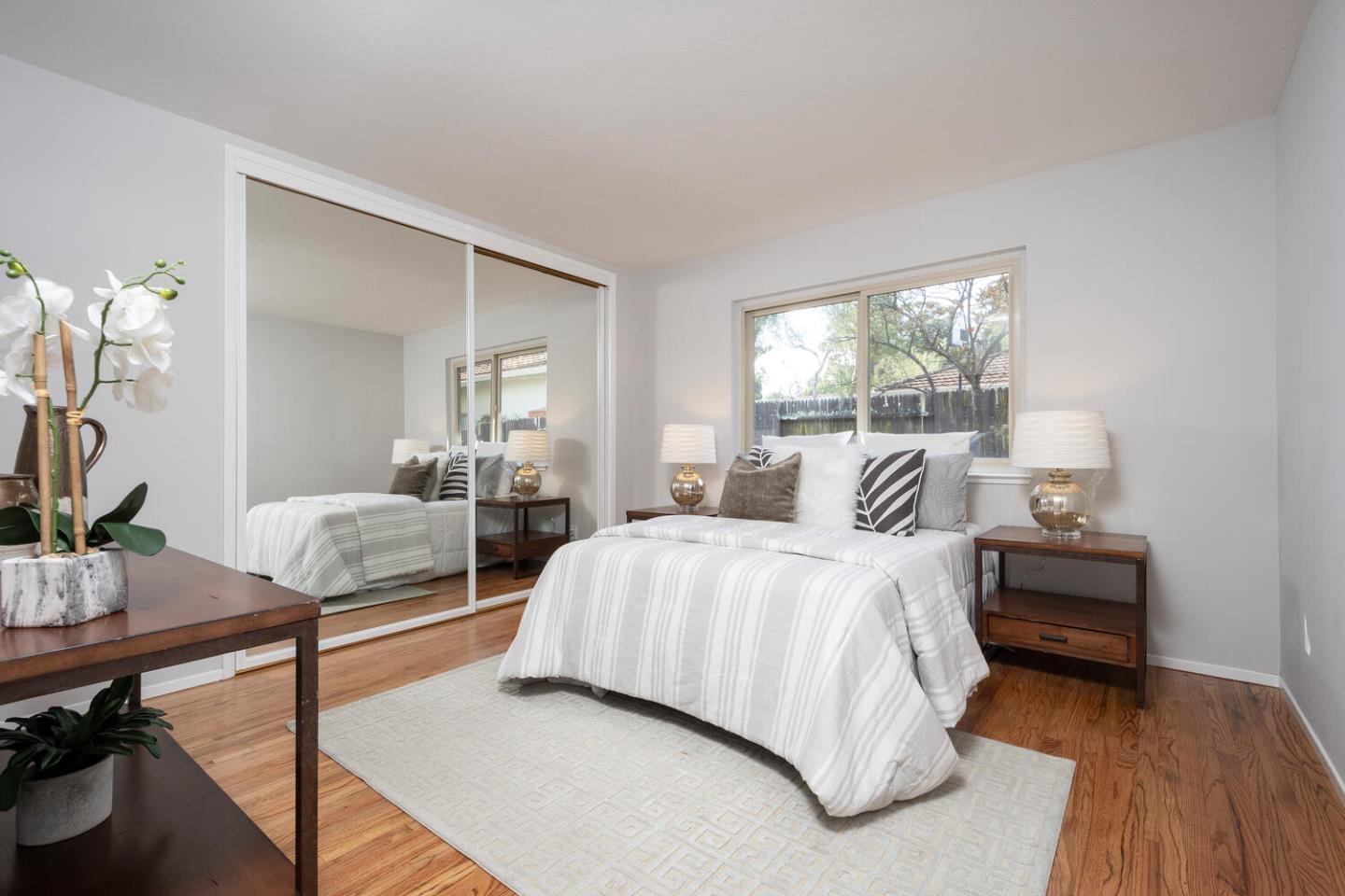 3115 Rivera Drive Burlingame, CA 94010 - Photo 18 of 26 a bedroom with a bed and a table in it