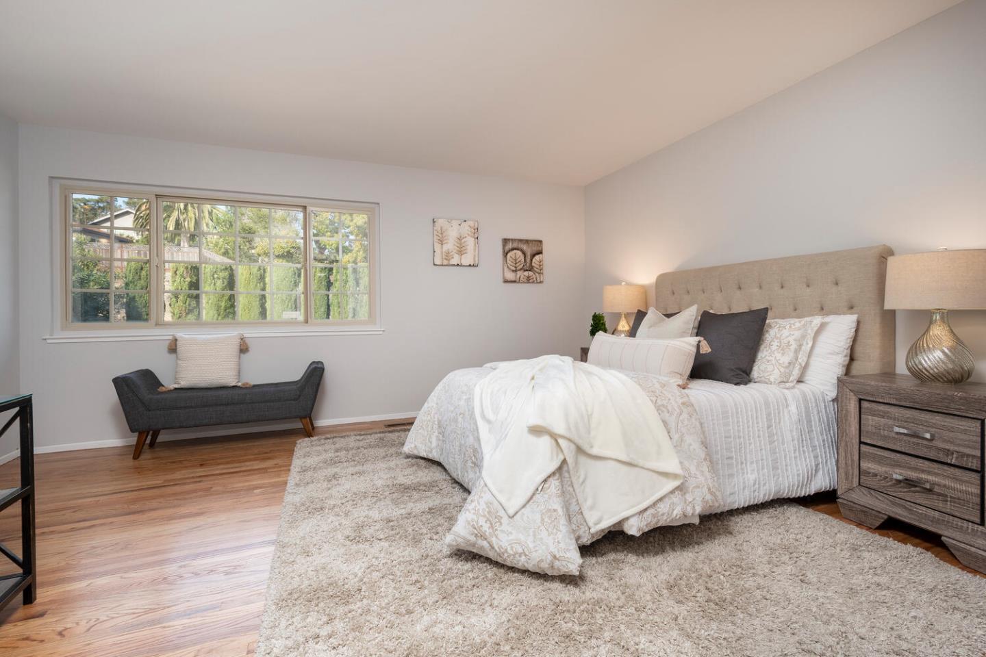 3115 Rivera Drive Burlingame, CA 94010 - Photo 20 of 26 a bed room with a bed and a couch