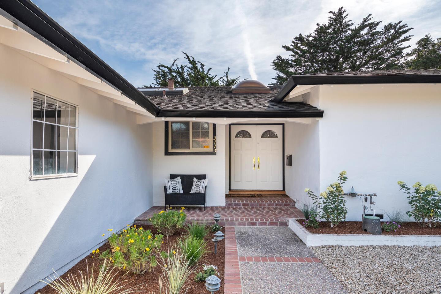 3115 Rivera Drive Burlingame, CA 94010 - Photo 3 of 26 a front view of a house with a yard