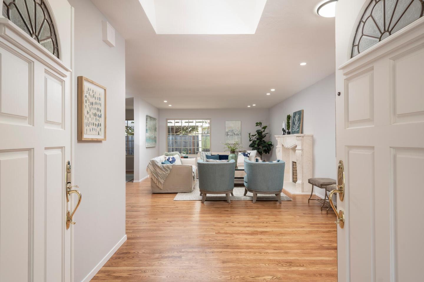 3115 Rivera Drive Burlingame, CA 94010 - Photo 5 of 26 a living room with furniture and a wooden floor