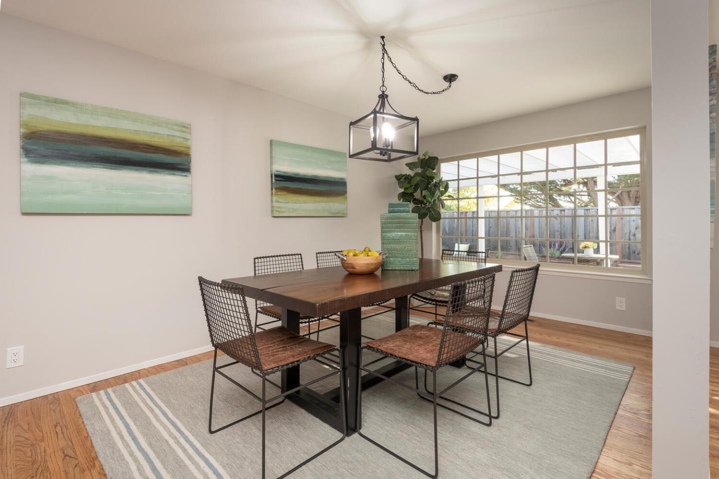 3115 Rivera Drive Burlingame, CA 94010 - Photo 8 of 26 a view of a dining room with furniture window and wooden floor