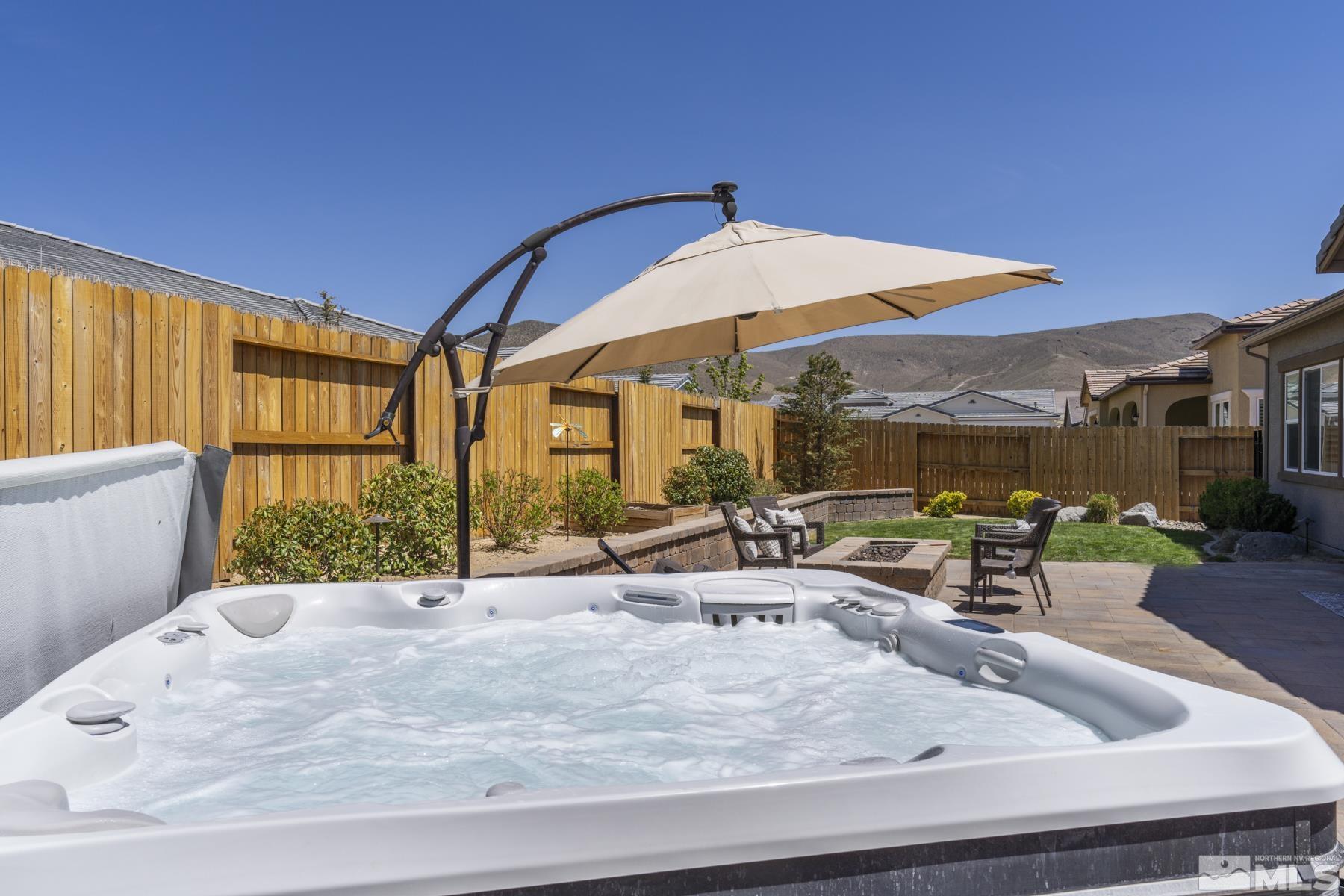 2329 Blushing Rock Drive Reno, NV 89521 - Photo 18 of 40 a view of a house with backyard and sitting area