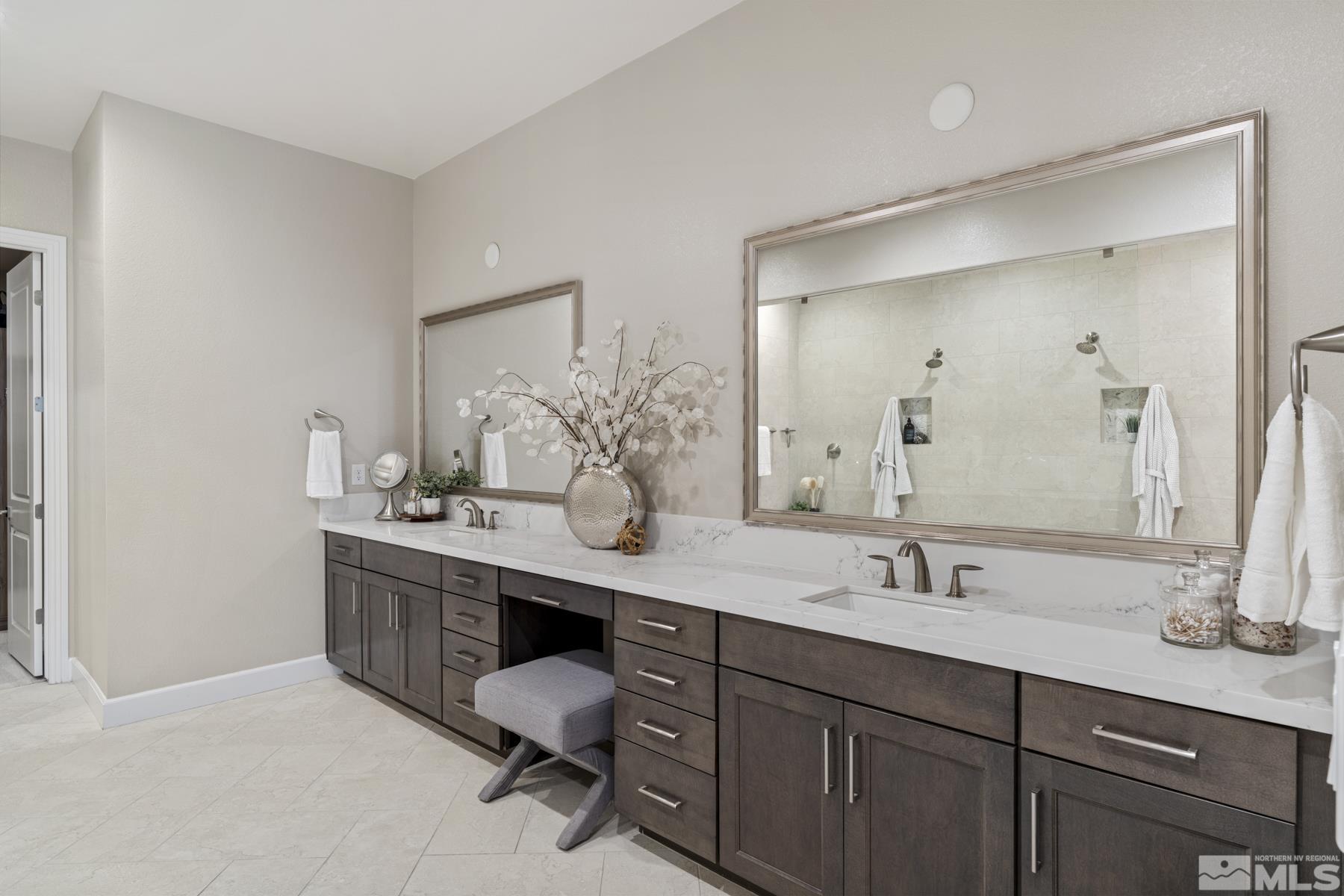 2329 Blushing Rock Drive Reno, NV 89521 - Photo 20 of 40 a bathroom with a sink double vanity and a mirror