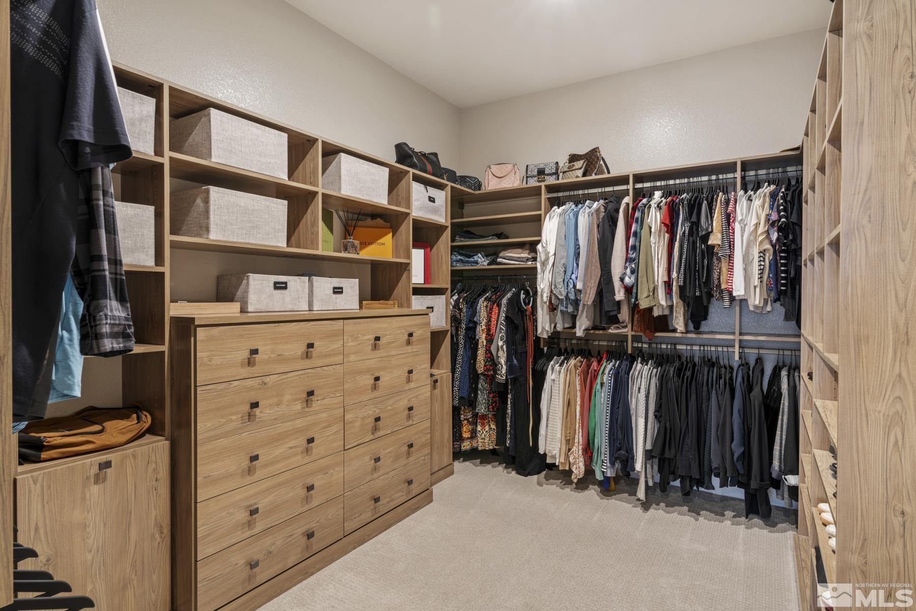2329 Blushing Rock Drive Reno, NV 89521 - Photo 23 of 40 a view of walk in closet with clothes and shoes