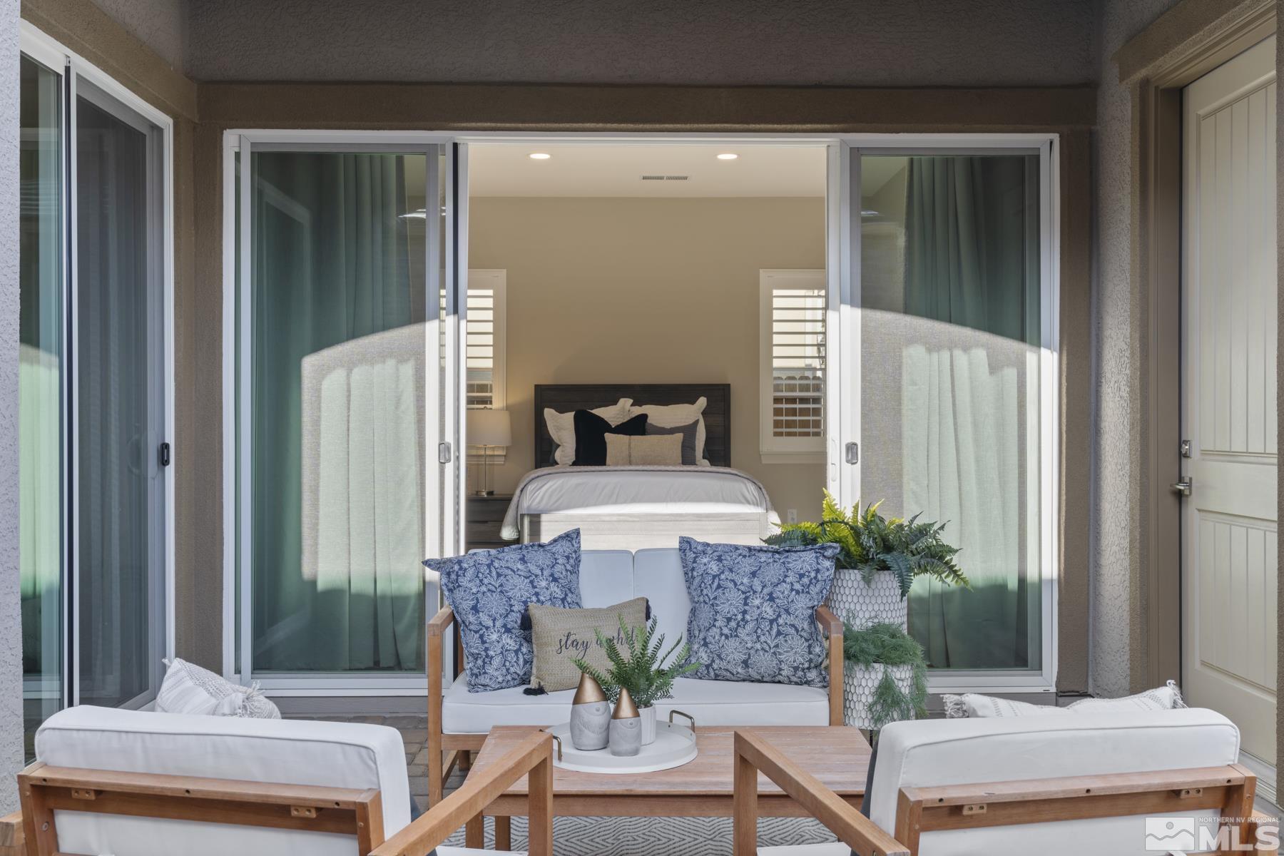 2329 Blushing Rock Drive Reno, NV 89521 - Photo 24 of 40 a front view of a house with outdoor seating