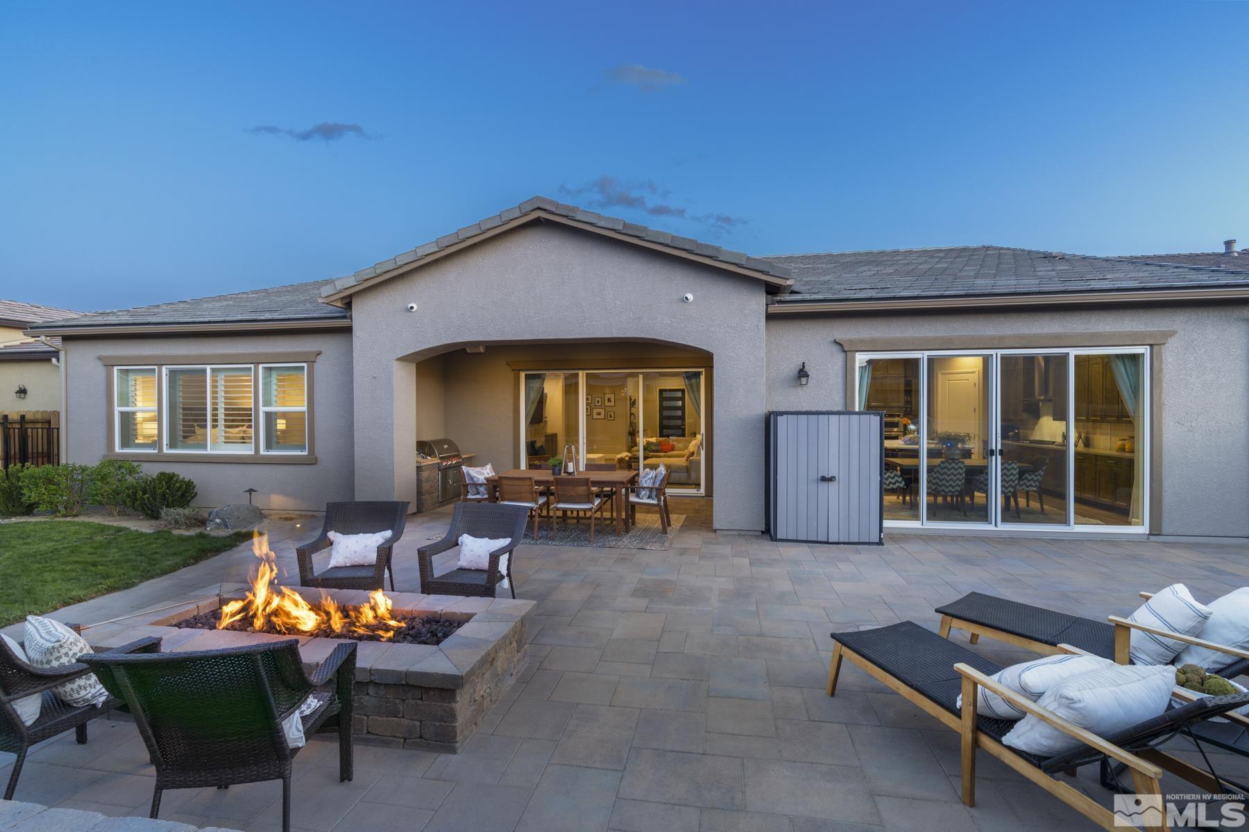 2329 Blushing Rock Drive Reno, NV 89521 - Photo 34 of 40 a view of a house with lounge chairs in patio