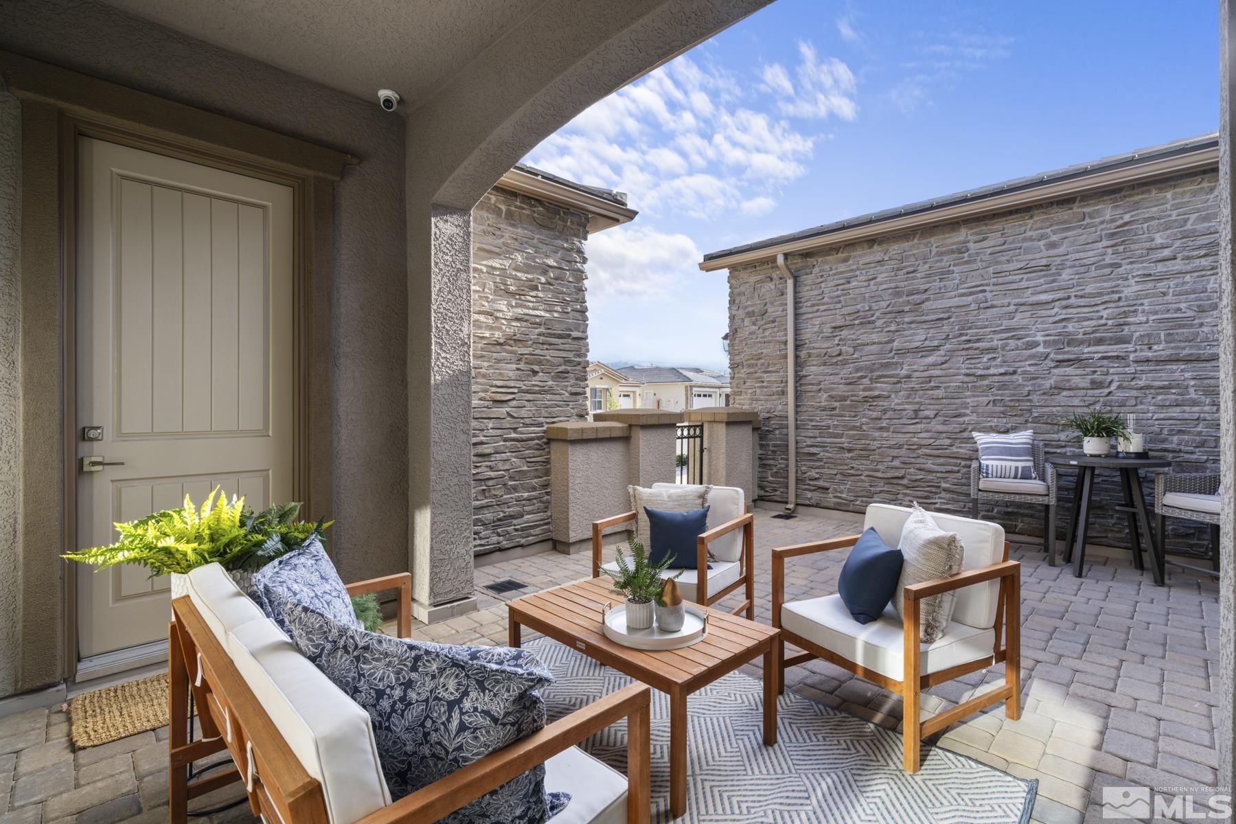 2329 Blushing Rock Drive Reno, NV 89521 - Photo 4 of 40 a outdoor living space with furniture and a potted plant