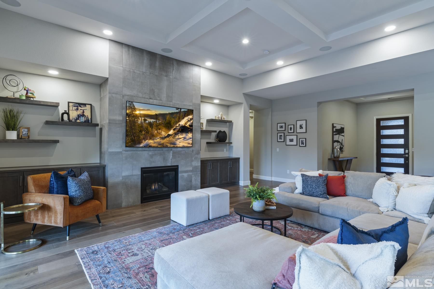 2329 Blushing Rock Drive Reno, NV 89521 - Photo 6 of 40 a living room with fireplace furniture and a flat screen tv