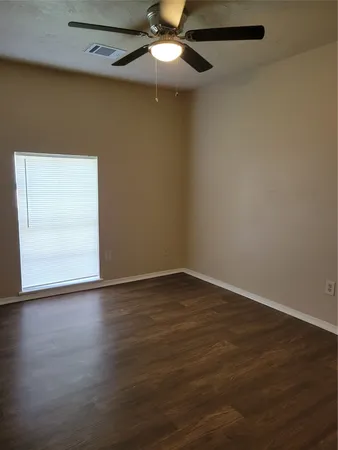 a bathroom with a toilet and a bathtub