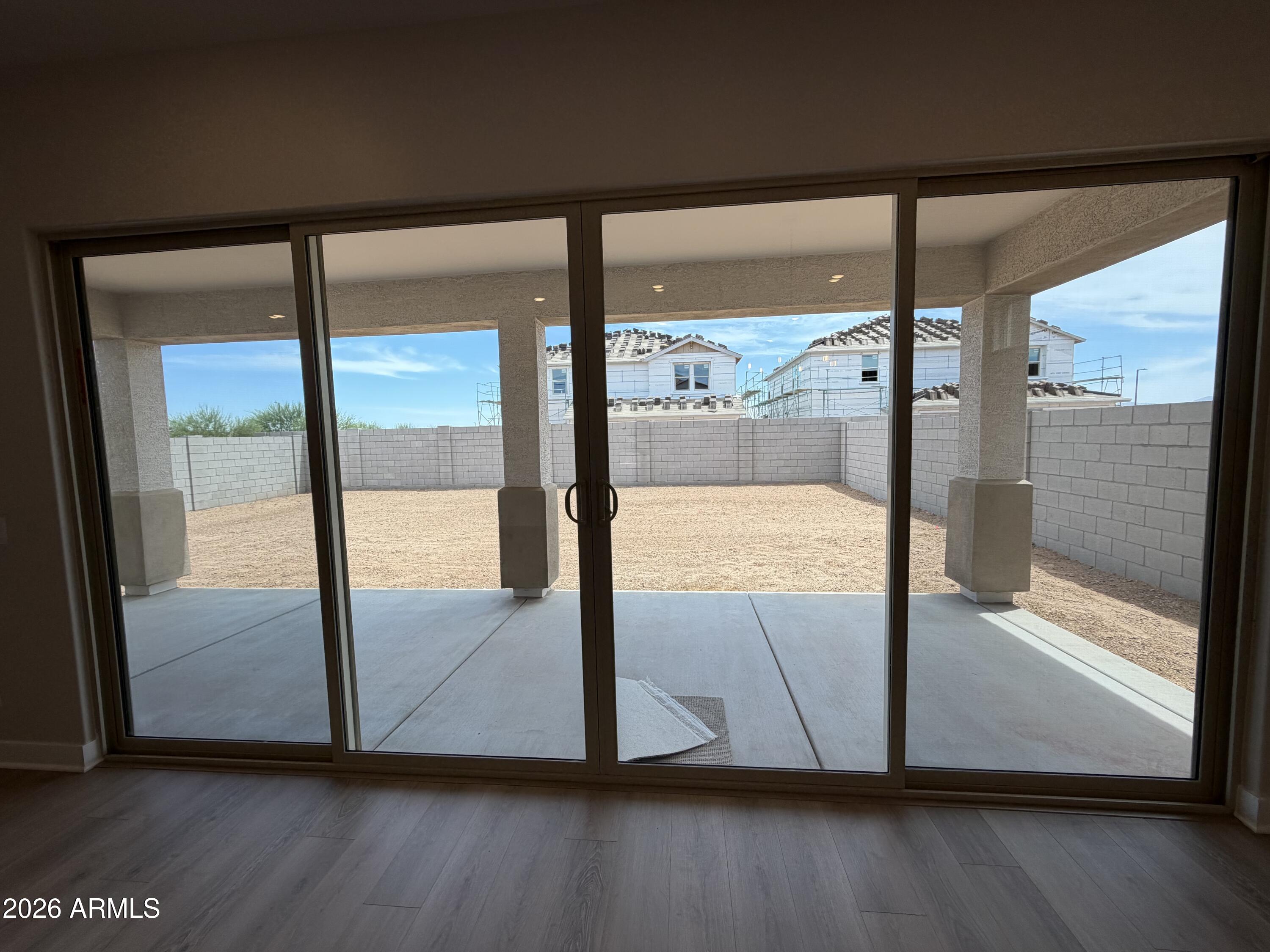 15767 West Sand Hills Road Surprise, AZ 85387 - Photo 8 of 60 a view of a living room and floor to ceiling window