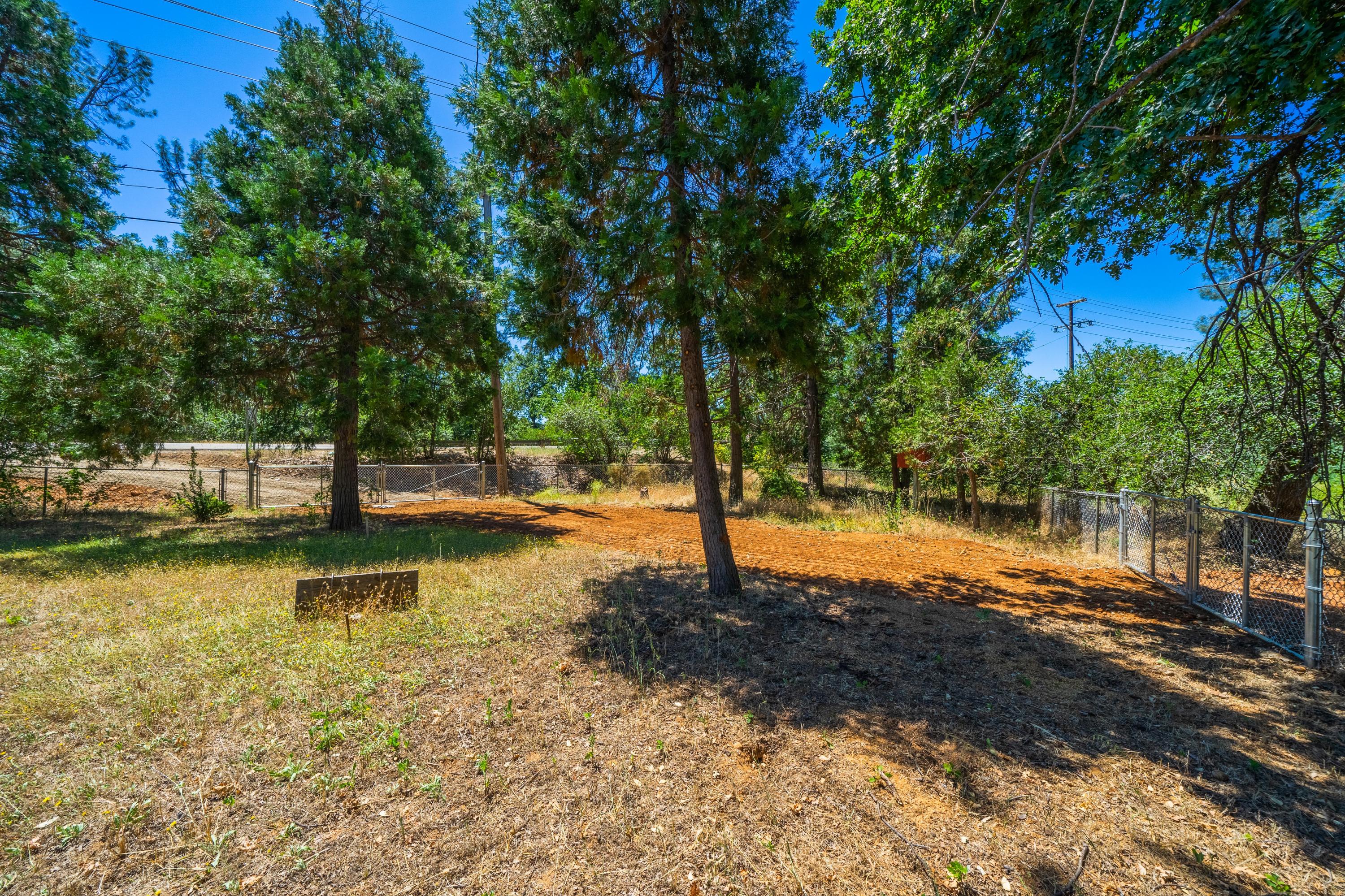 1542 Old Alturas Road Redding, CA 96003 - Photo 16 of 20 a view of a lake with houses