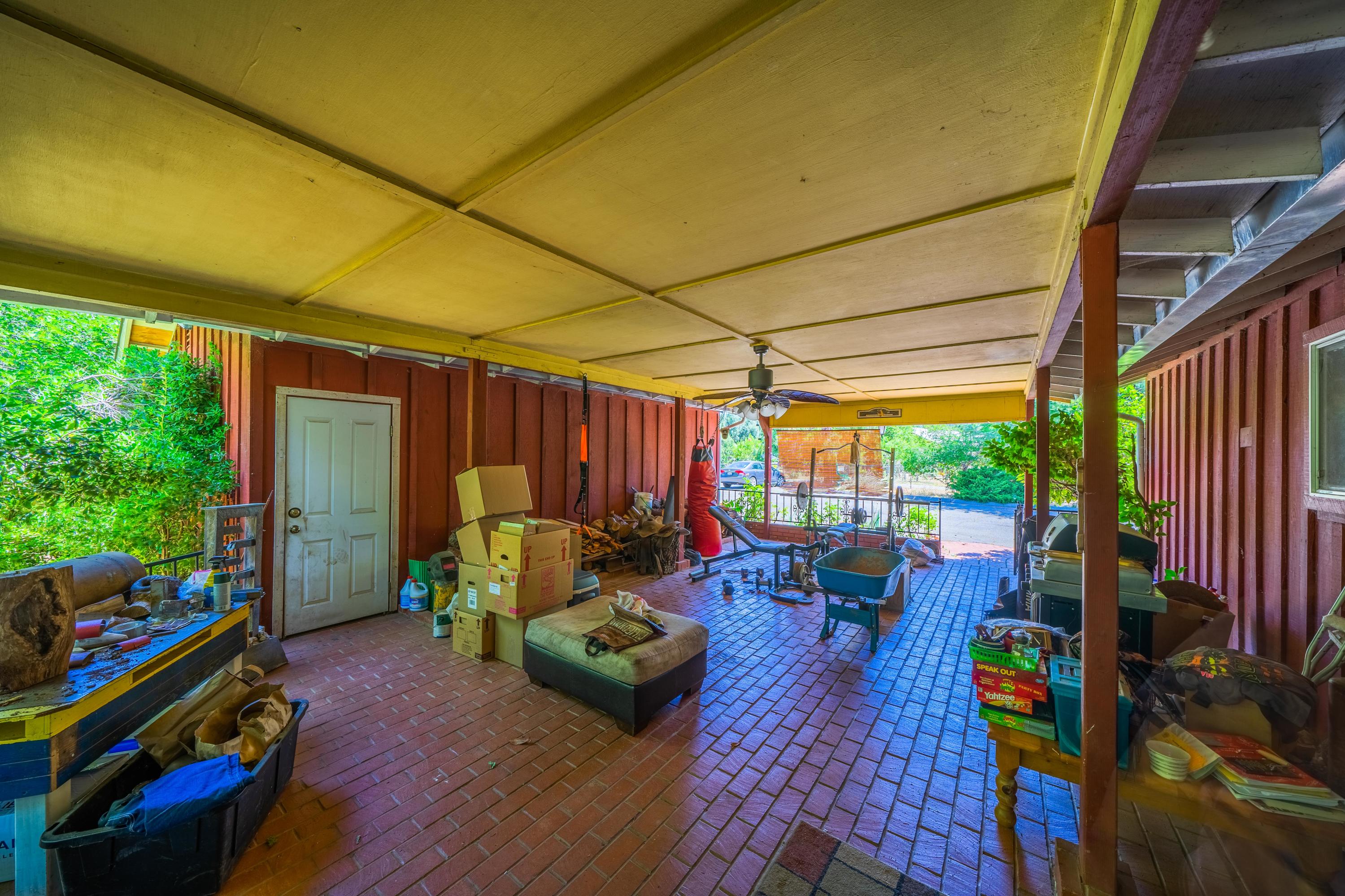 1542 Old Alturas Road Redding, CA 96003 - Photo 7 of 20 a living room with furniture and a wooden floor