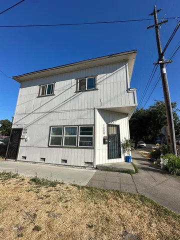 a front view of a house with a garage