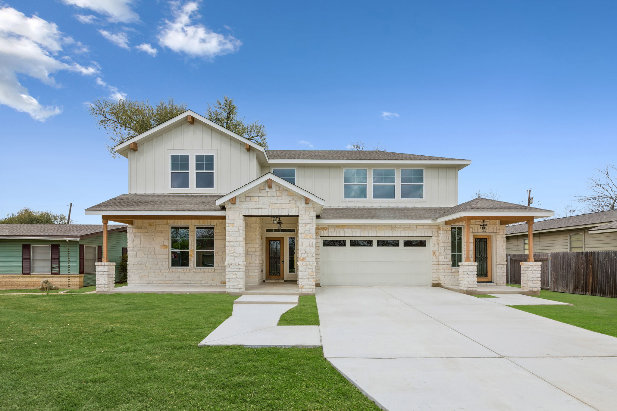 Handsome new construction situated in a quiet, established Taylor neighborhood. Grass digitally enhanced as sod was not laid at time of photos.
