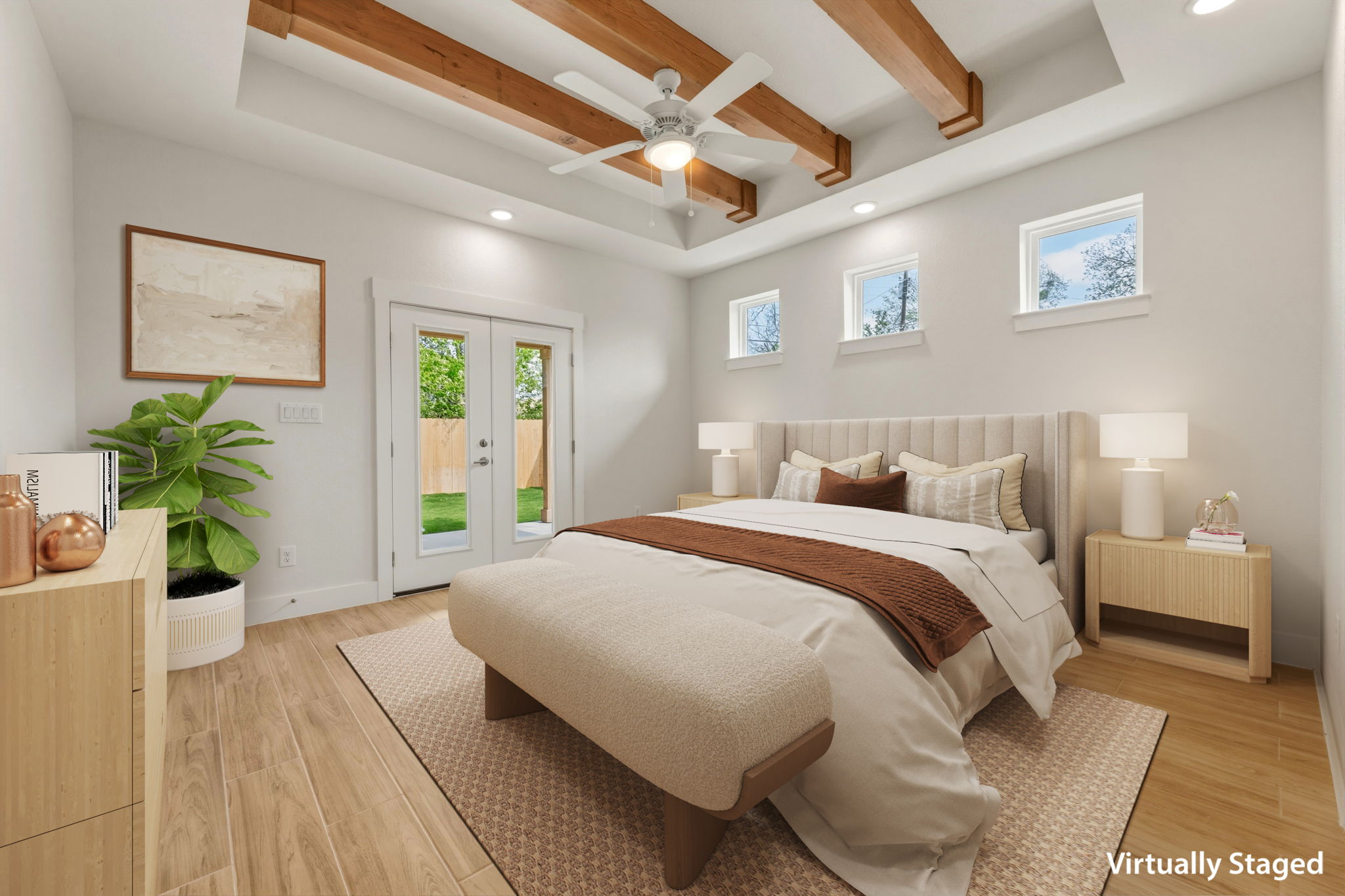1412 Kent Street Taylor, TX 76574 - Photo 23 of 40 a spacious bedroom with a bed and a potted plant