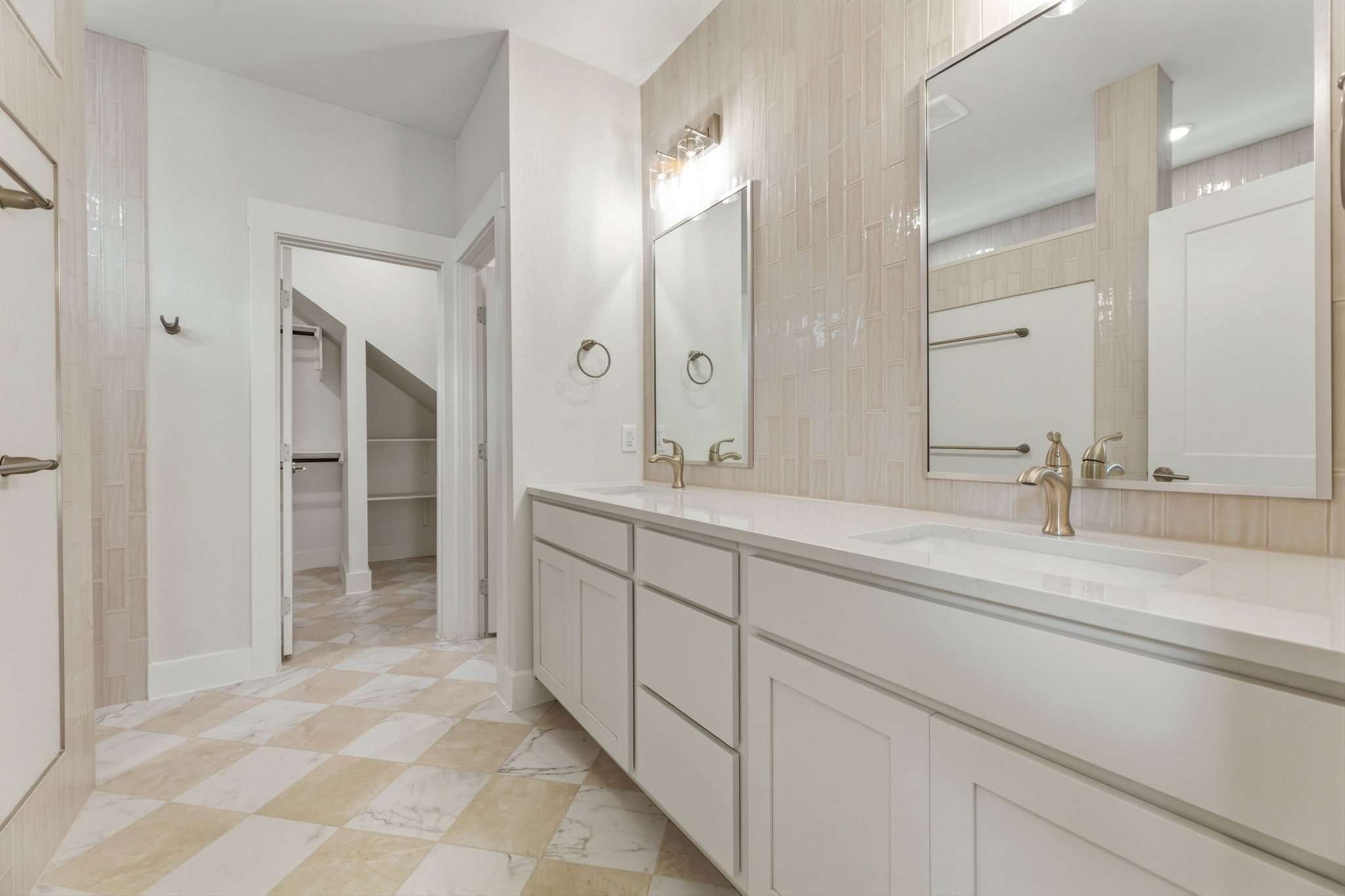 1412 Kent Street Taylor, TX 76574 - Photo 27 of 40 a spacious bathroom with a shower sink and mirror
