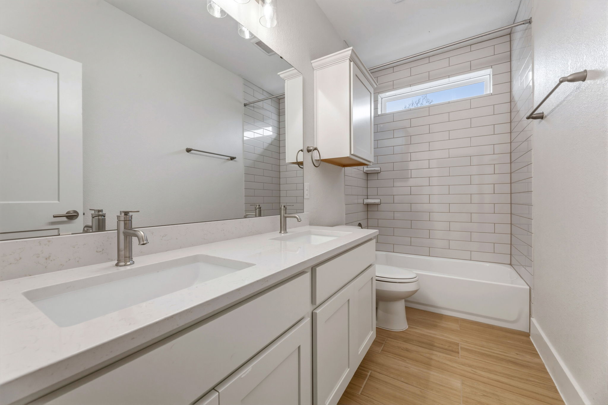 1412 Kent Street Taylor, TX 76574 - Photo 6 of 40 a bathroom with a sink a toilet and shower