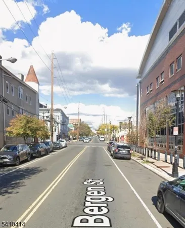 a city street lined with tall buildings