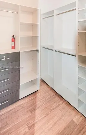 a view of an empty walk in closet