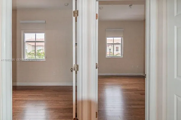 a bathroom with a sink double vanity and a bathtub