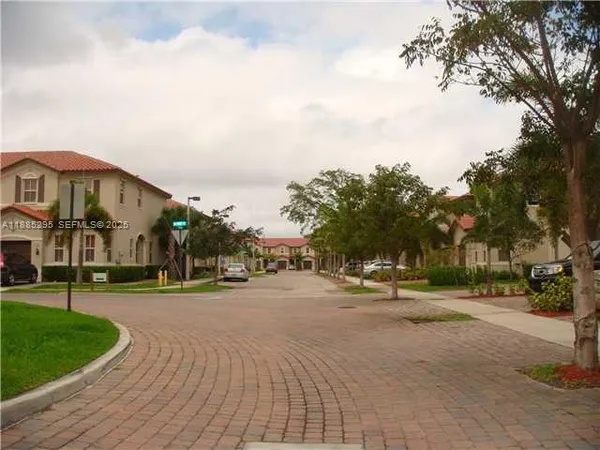 a view of a street with houses