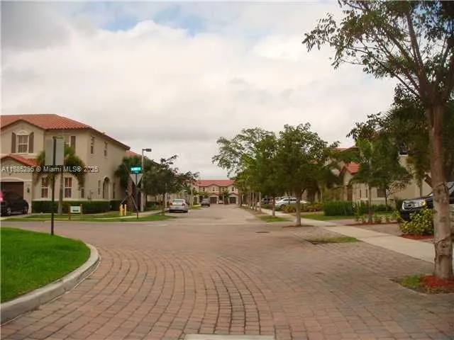 a view of a street with houses