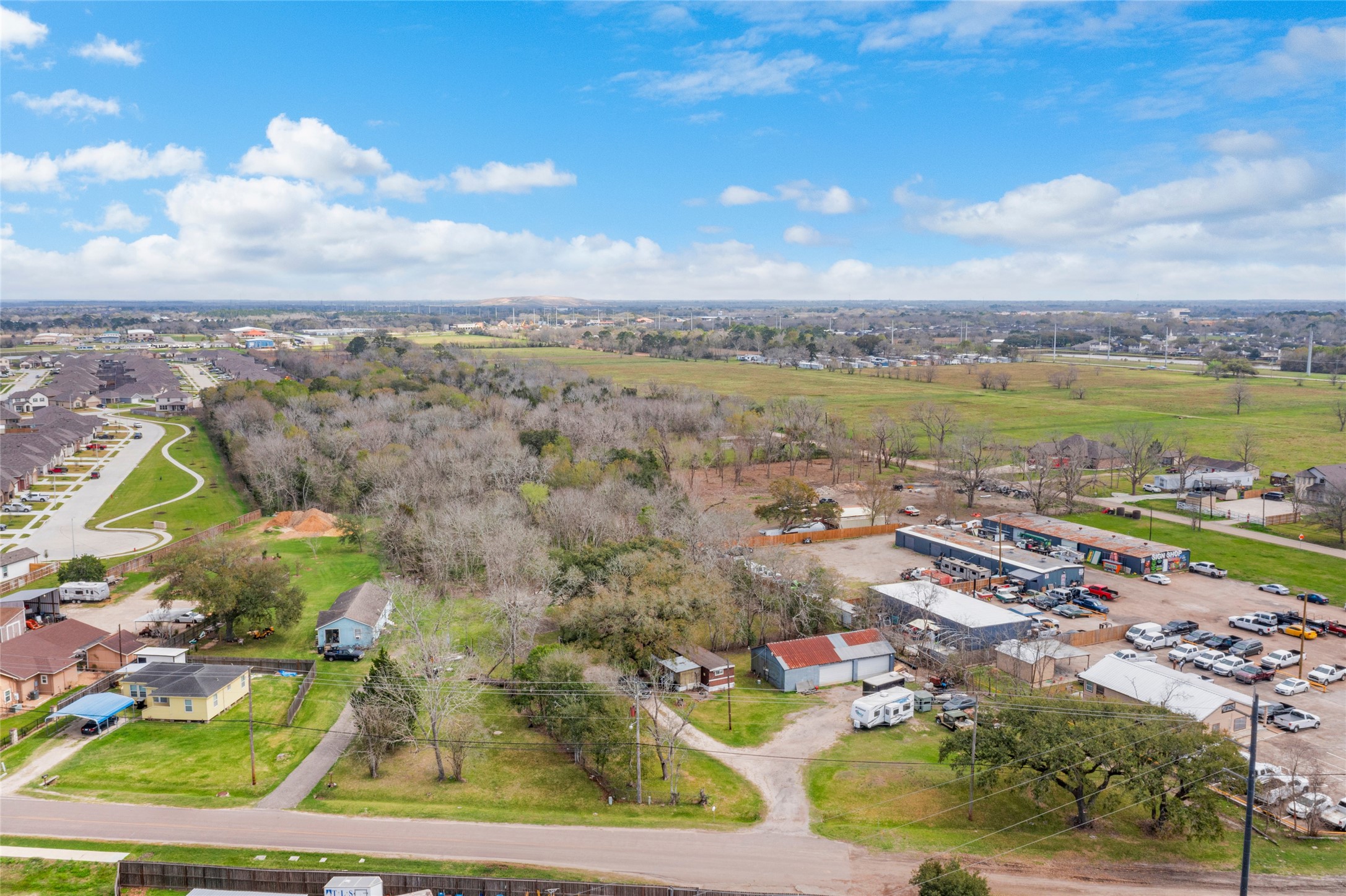 1806 FM 528 Road Alvin, TX 77511 - Photo 3 of 17 an aerial view of residential building and lake