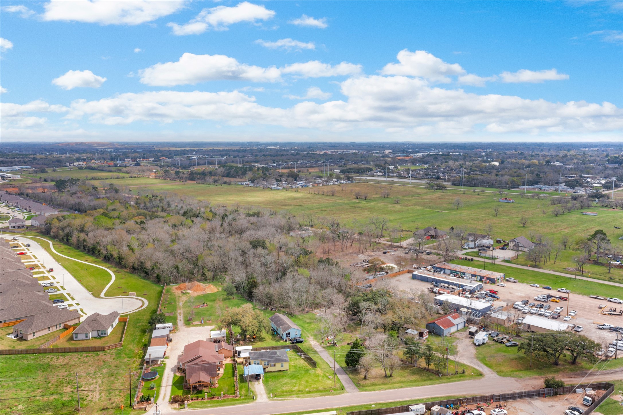 1806 FM 528 Road Alvin, TX 77511 - Photo 4 of 17 a view of a city with an ocean