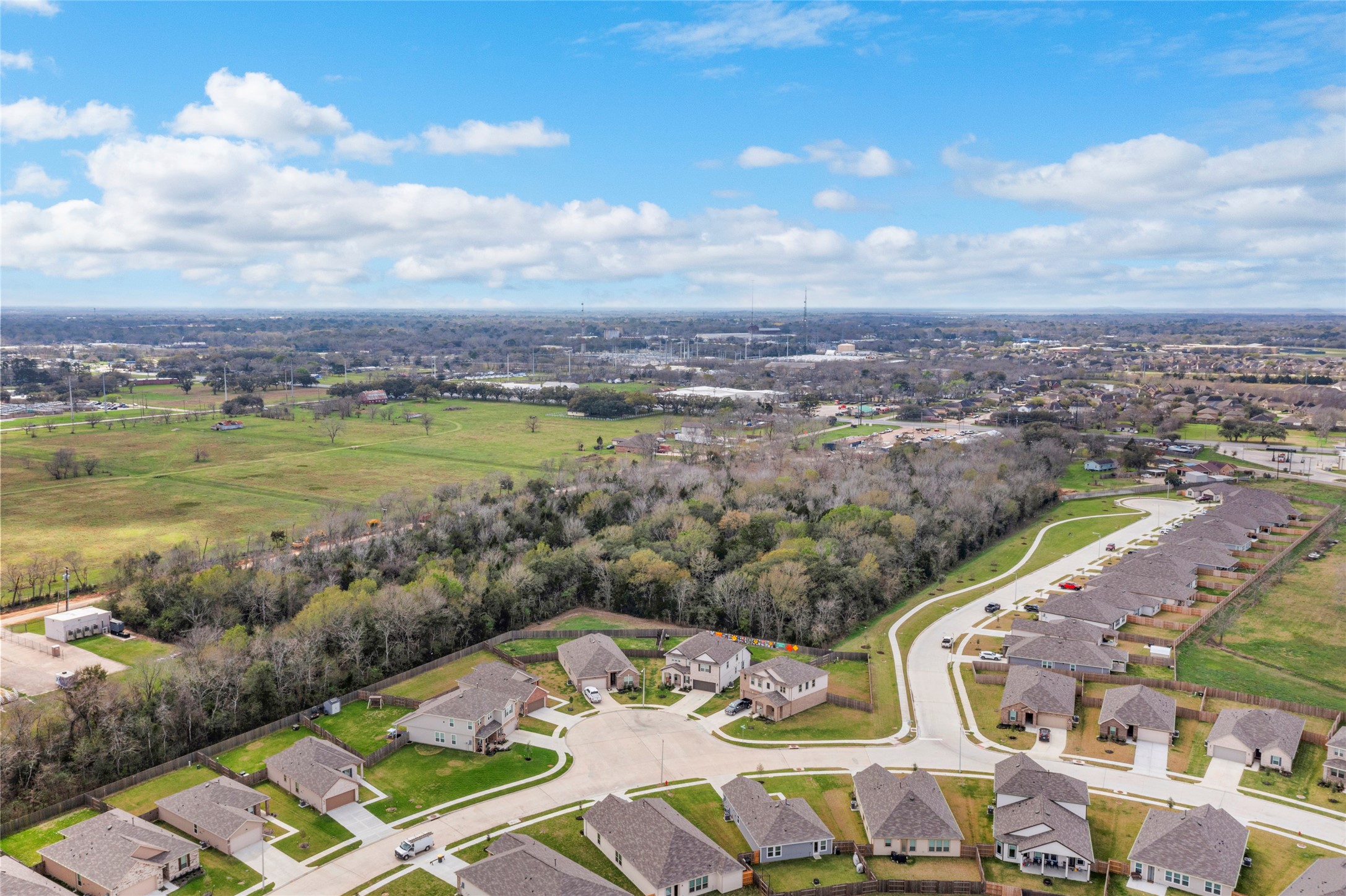 1806 FM 528 Road Alvin, TX 77511 - Photo 5 of 17 a view of a city from a lake