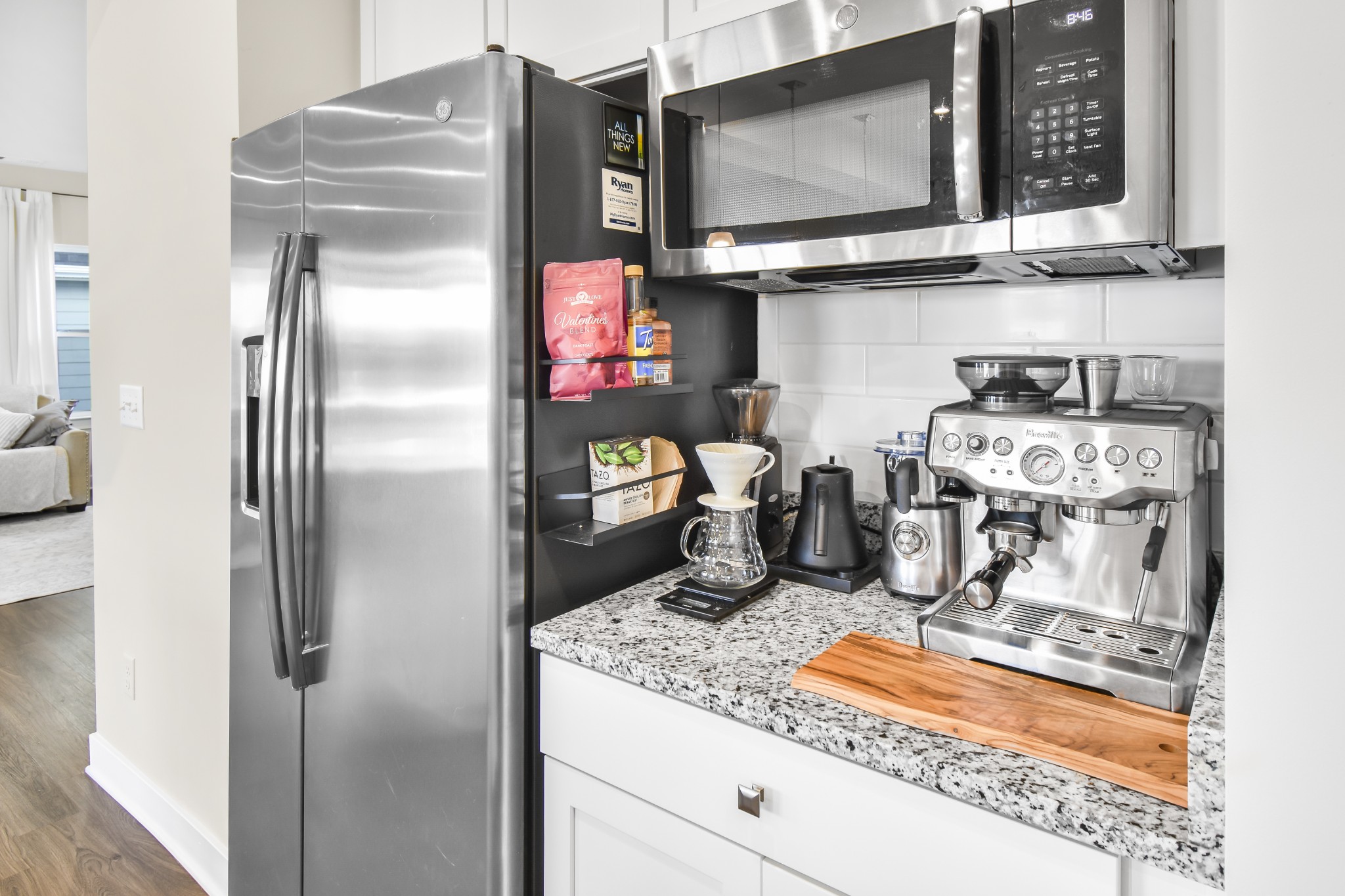 308 Collier Road Mount Juliet, TN 37122 - Photo 12 of 36 a kitchen with refrigerator and washing machine