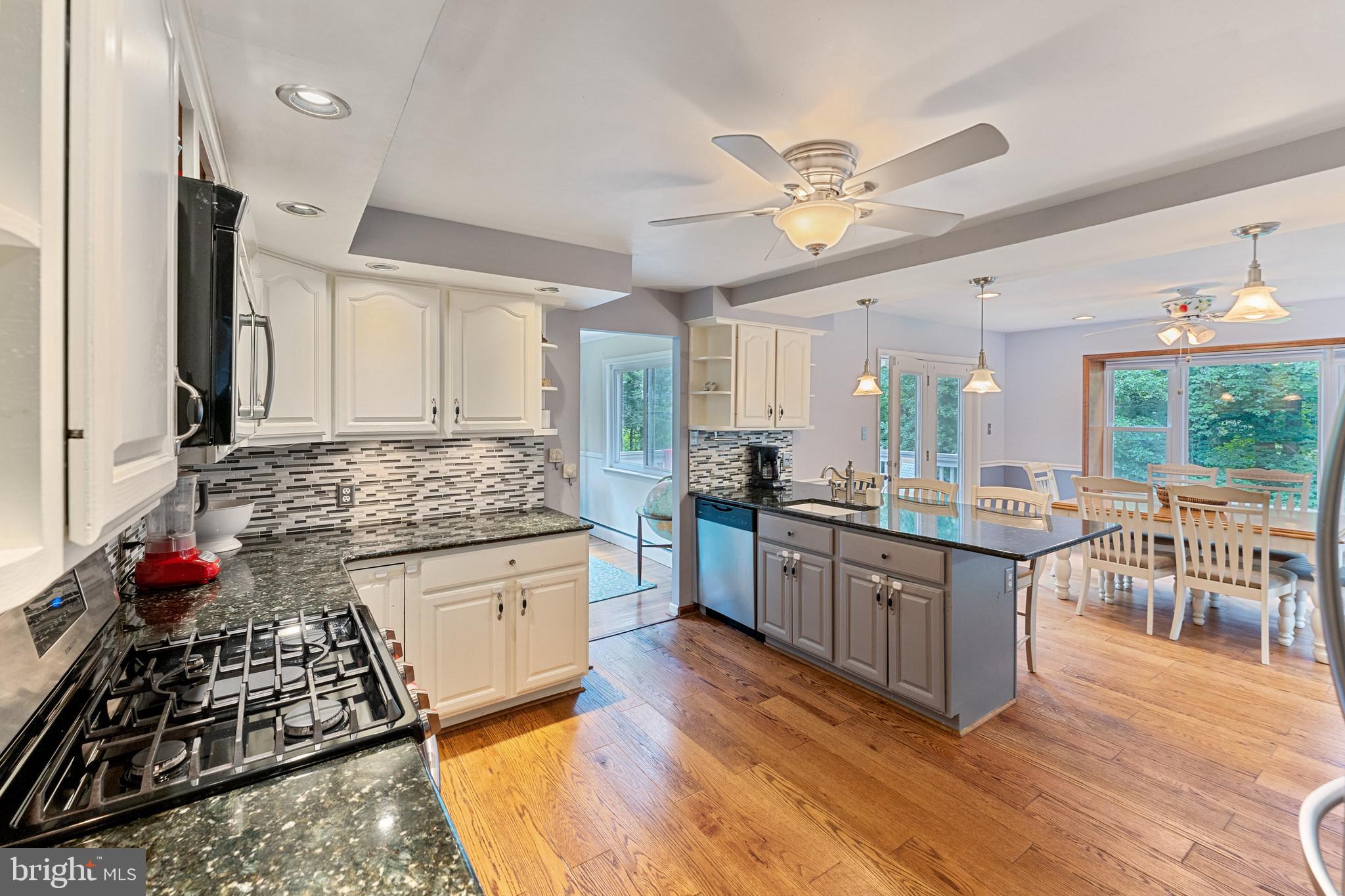 1070 Dale Road Media, PA 19063 - Photo 19 of 40 a kitchen with lots of counter top space and wooden floor