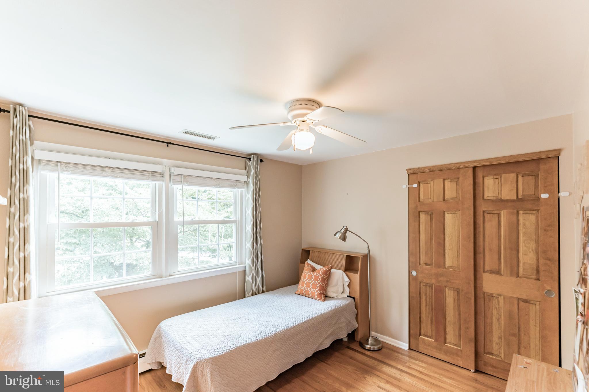 1070 Dale Road Media, PA 19063 - Photo 25 of 40 a bedroom with a bed and a table with chair