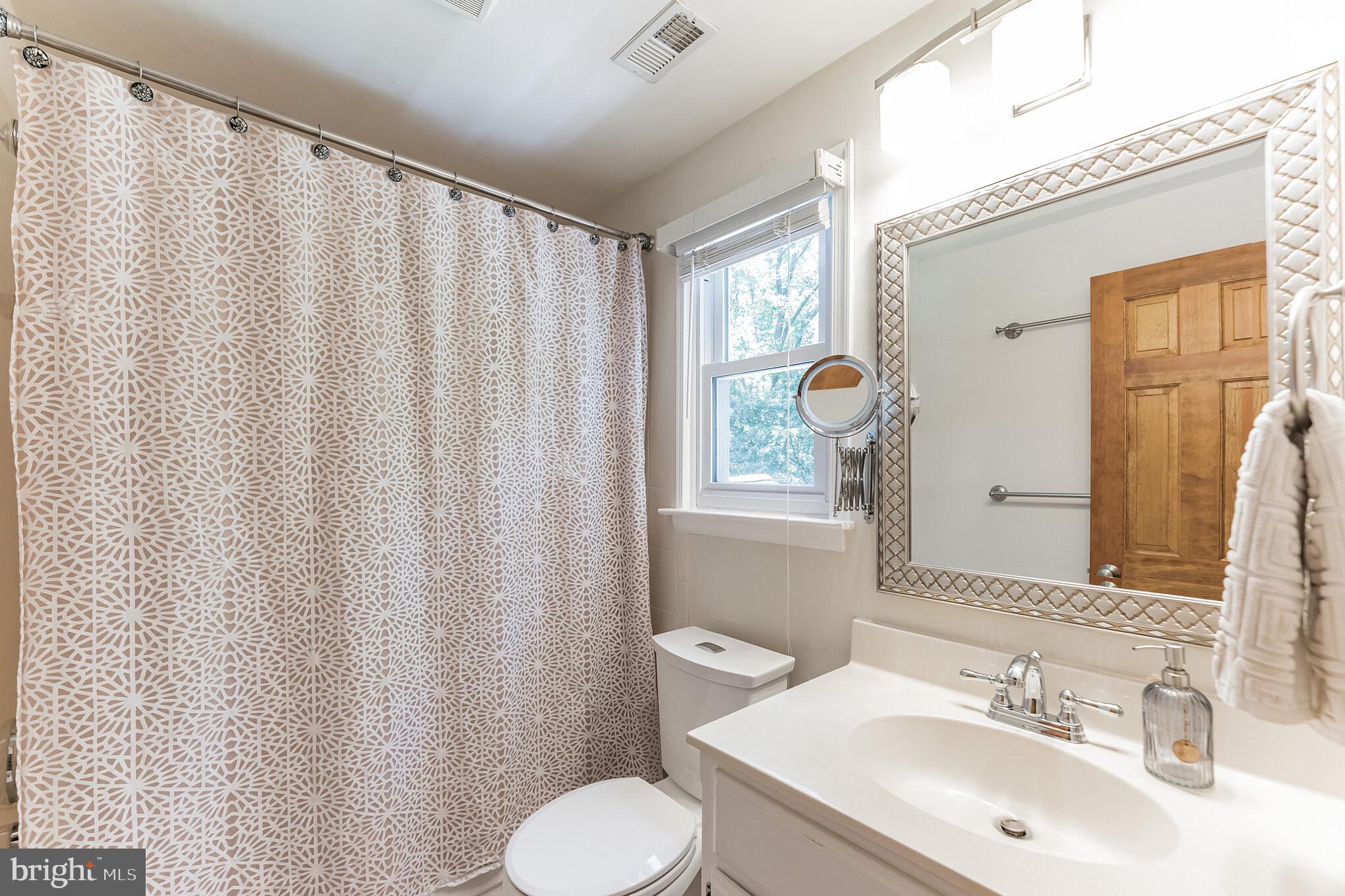 1070 Dale Road Media, PA 19063 - Photo 33 of 40 a bathroom with a sink and a mirror