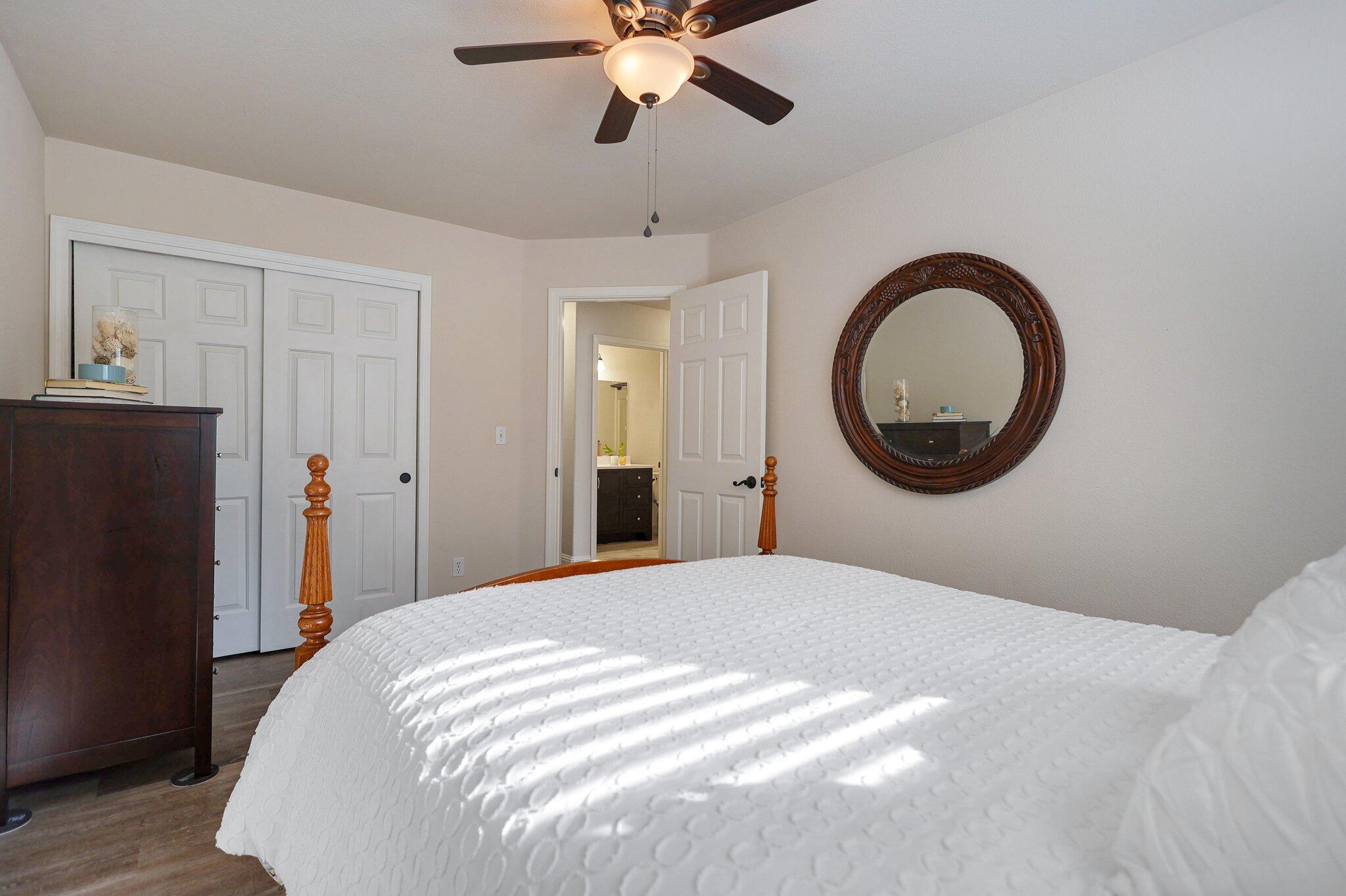 21365 Dersch Road Anderson, CA 96007 - Photo 22 of 55 a bedroom with a bed and a large mirror
