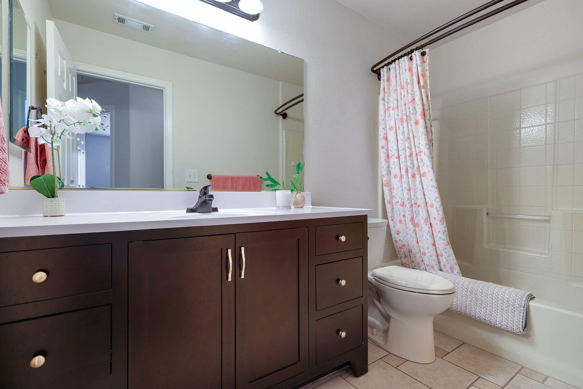 21365 Dersch Road Anderson, CA 96007 - Photo 25 of 55 a bathroom with a sink a toilet and a mirror