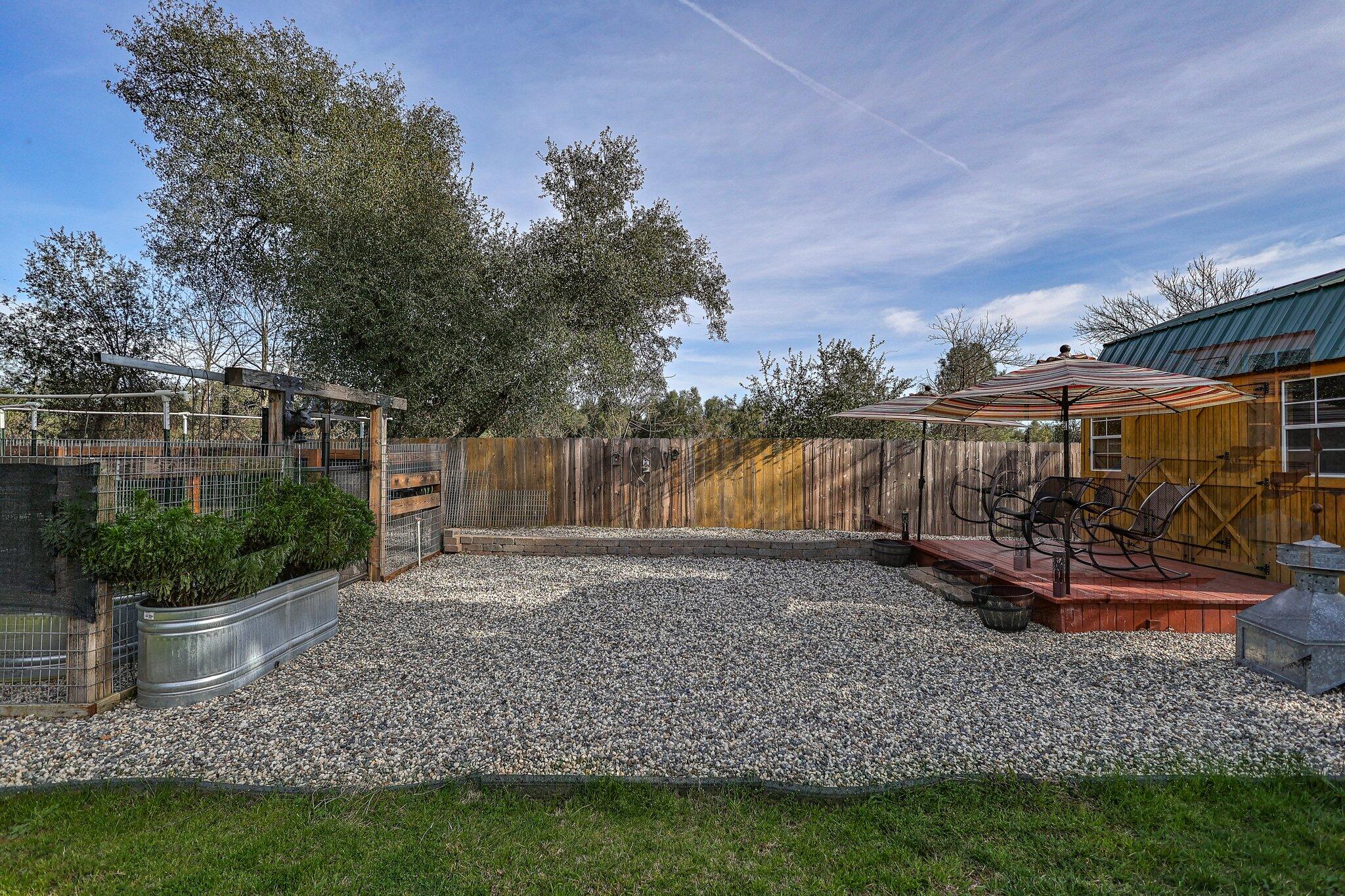 21365 Dersch Road Anderson, CA 96007 - Photo 38 of 55 a view of backyard with seating and green space