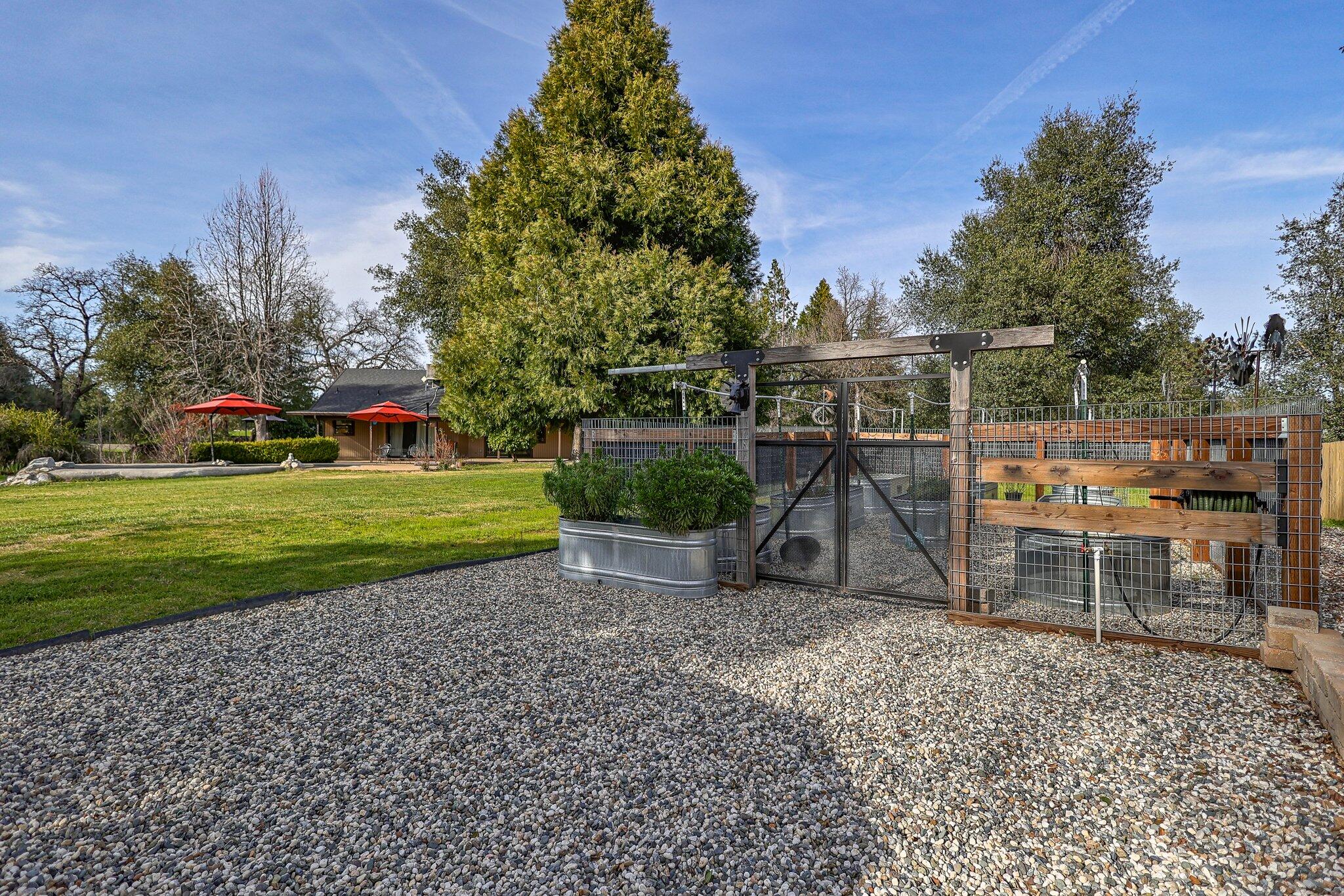 21365 Dersch Road Anderson, CA 96007 - Photo 40 of 55 a view of a house with a yard